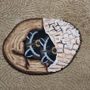 Hand painted raccoon pair wood piece